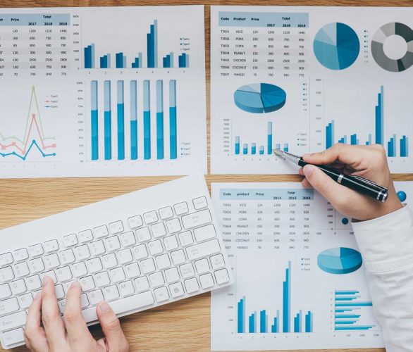 businessman-working-on-a-graph-document-financial--K5PD3R3 businessman-working-on-a-graph-document-financial--K5PD3R3