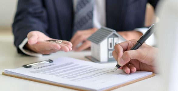 signing-a-loan-for-a-home-purchase-CVQDFTV signing-a-loan-for-a-home-purchase-CVQDFTV